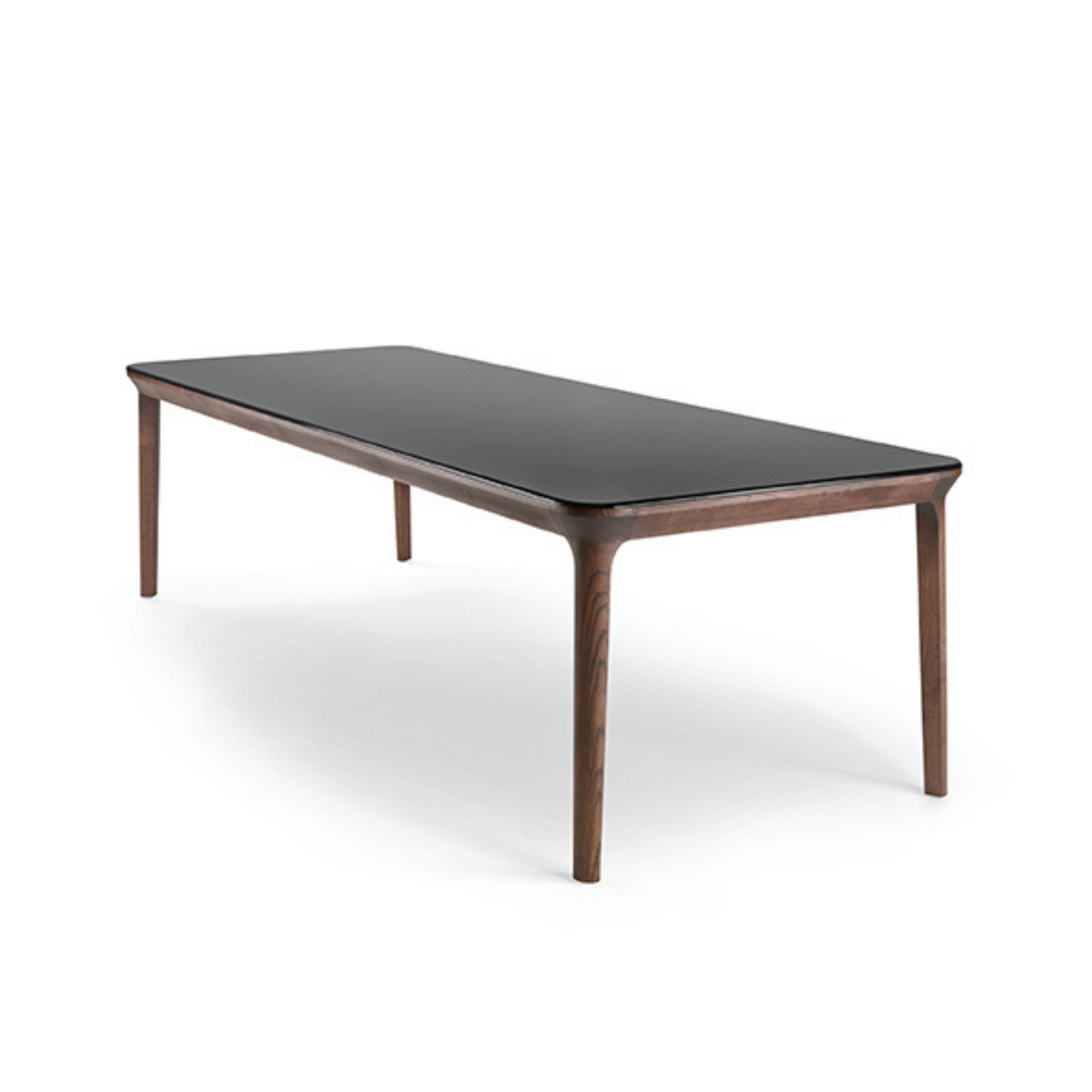 An essential design, an apparent simplicity for a table of complex details and finishes.